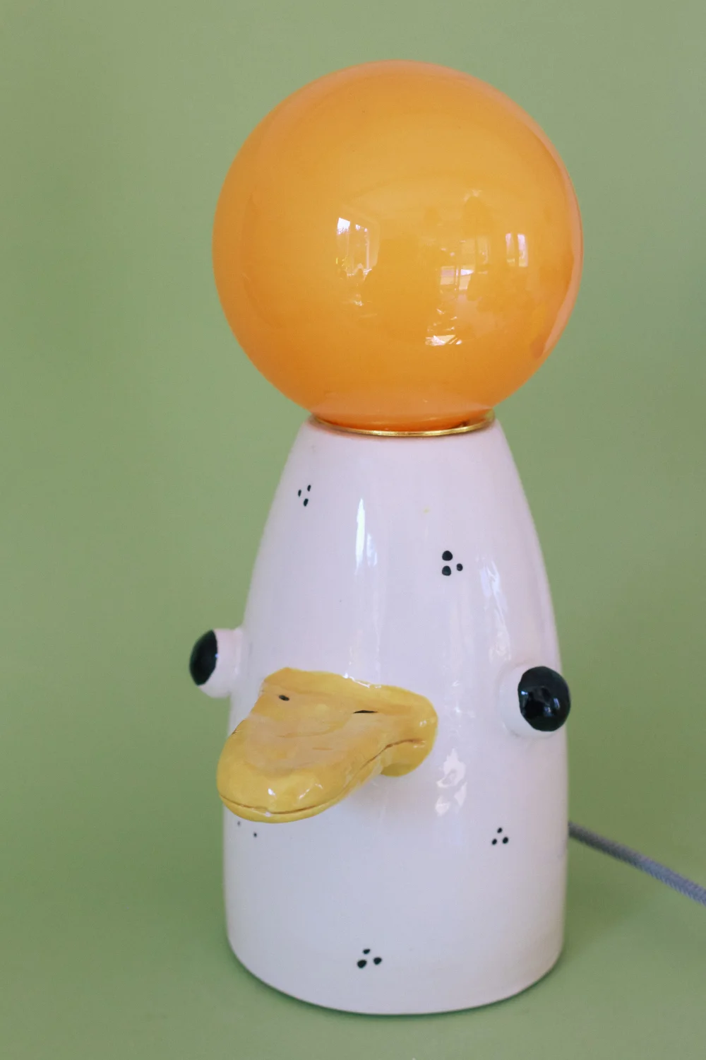 lampa gęś z czarno białym kablem